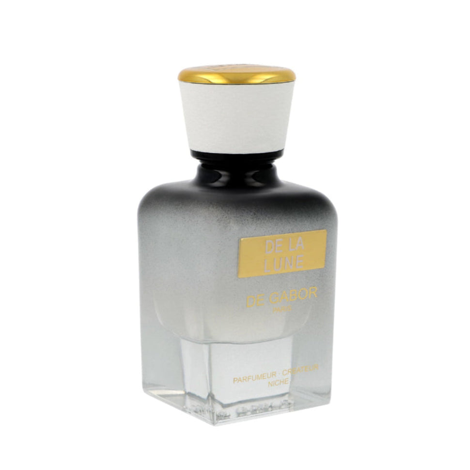 Perfume bottle with black and gold cap on a white background