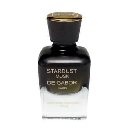 Perfume bottle labeled 'Stardust Musk De Gabor' on a white background